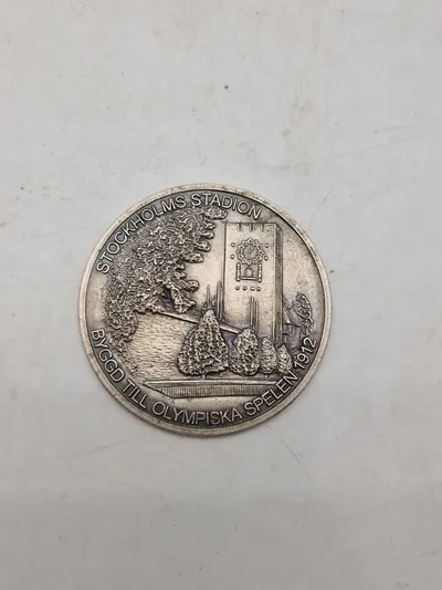 Token med reklame for Stockholm stadion