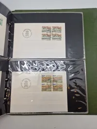 Samling førstedags kuverter mm i mappe