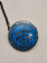 Original nål fra Frederiksborg Amts sygeplejeskole - sølv og emalje