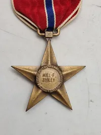 Originalt ww2 Broncestar lot, navngiven