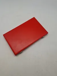 Smykkesæt bestående af halskæde, armbånd, øreringe og broche. Sættet er af sterlingsølv med isatte sten. Designet af Hans Siersbøl