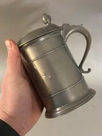 Originalt tinkrus med ilagt engelsk mønt