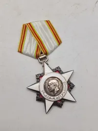 Original tunesisk order  of the republic 1.model (1959-67) med æske samt diverse. Medaljen er af sølv og emalje
