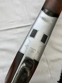 Huglo 103DE kaliber 12/76, serie nummer: OZS1558 som ny