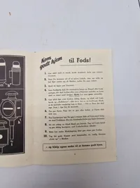 Original pjece ww2 - Kom godt hjem!
REGLER FOR LYGTEFØRING OG FÆRDSEL UNDER MØRKLÆGNINGEN