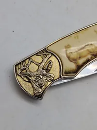 Veludført foldekniv med etui