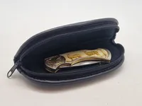 Veludført foldekniv med etui