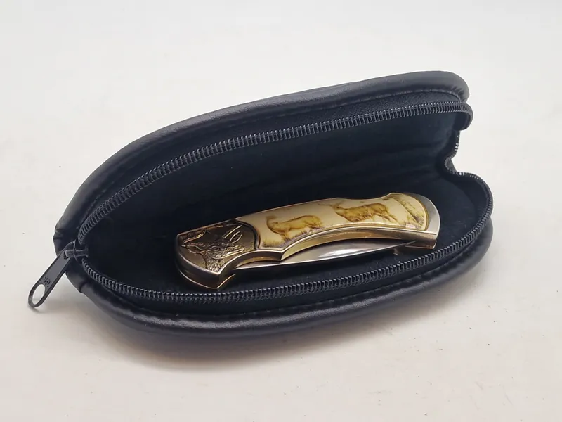 Veludført foldekniv med etui