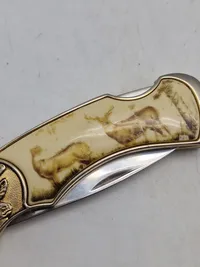 Veludført foldekniv med etui