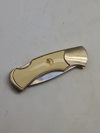 Veludført foldekniv med etui