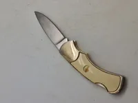 Veludført foldekniv med etui