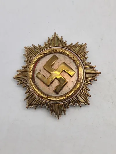 Deutsches Kreuz im Gold - original “57 version” med påsat hagekors