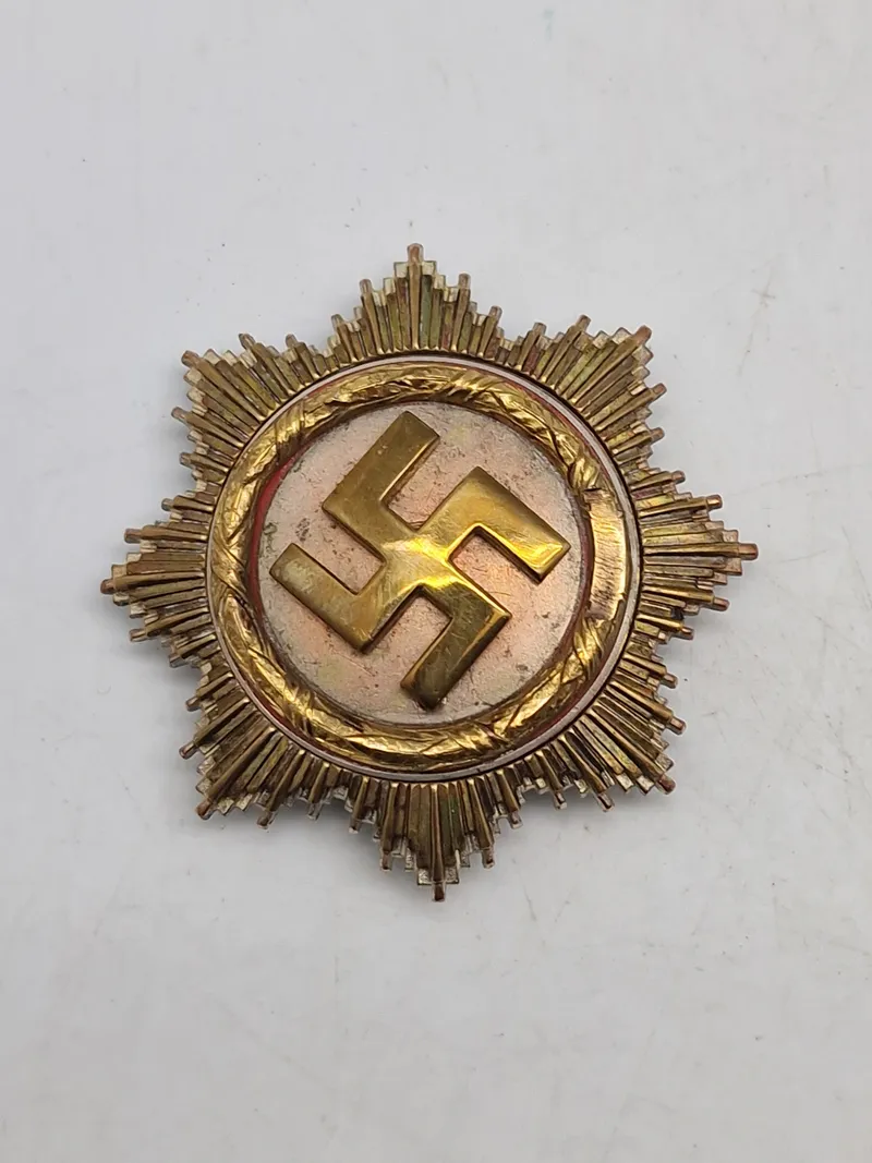 Deutsches Kreuz im Gold - original “57 version” med påsat hagekors