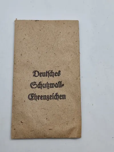 Original tildelingspose for Deutsches
Schukwall-
Ehrenzeichen