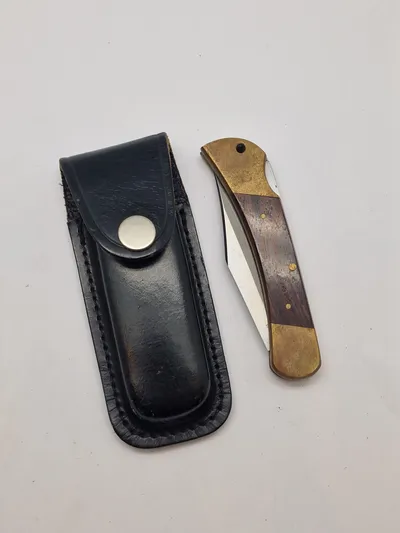 Veludført foldekniv med etui