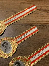 Originale cerut mavebælter med royale fotos