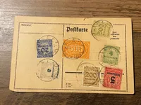Originalt ww1 postkort med frimærker med høj Mark-værdi