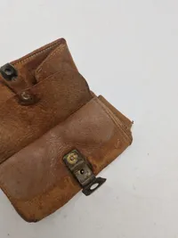 Gammel pung med 11 skillings mønter