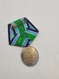 Medalje sterlingsølv 25 års frivillig tjeneste.