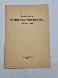 Beskrivelse af
OMDREJNINGSPISTOL
Model 1865