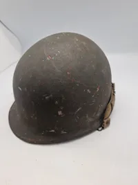 Original amerikansk stålhjelm med  inderliner