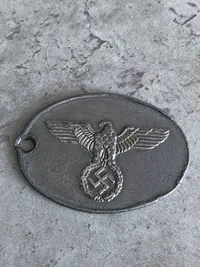 Gestapo id disk - Postwar