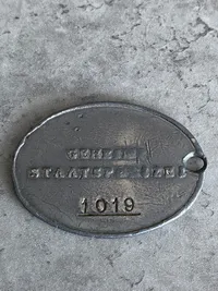 Gestapo id disk - Postwar