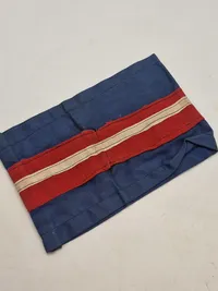 Originalt armbind fra den danske modstandsbevægelse. Bornholm