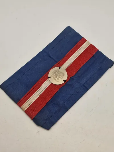 Originalt armbind fra den danske modstandsbevægelse. Bornholm