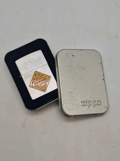Zippo lighter - Never mind the dog - beware of the owner