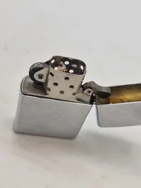 Zippo lighter - Never mind the dog - beware of the owner