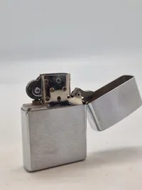 Zippo lighter - Never mind the dog - beware of the owner