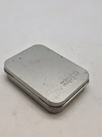 Zippo lighter - Never mind the dog - beware of the owner