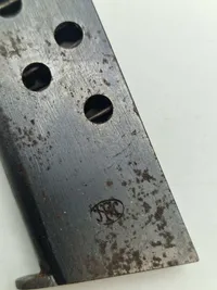 Magasin og grebsskaller for  belgisk Browning