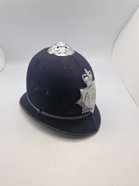 Original Engelsk bobby hjelm fra Metropolitan police ( London )