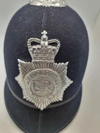 Original Engelsk bobby hjelm fra Metropolitan police ( London )