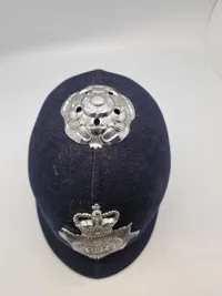 Original Engelsk bobby hjelm fra Metropolitan police ( London )