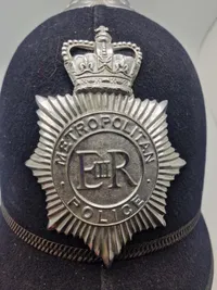 Original Engelsk bobby hjelm fra Metropolitan police ( London )