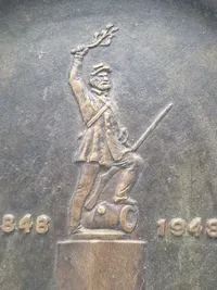 Stor bronze plakette med landsoldaten 1848-1948