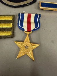 Original Nummerert WW2 Silver star lot  fra soldat der var med til at befri Dachau