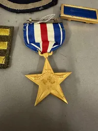 Original Nummerert WW2 Silver star lot  fra soldat der var med til at befri Dachau