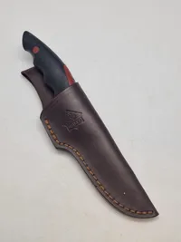 Brusletto kniv med puma skede