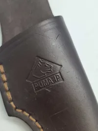 Brusletto kniv med puma skede