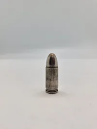 Original 9 mm værkstedspatron/eksercerpatron, brugt af politiet