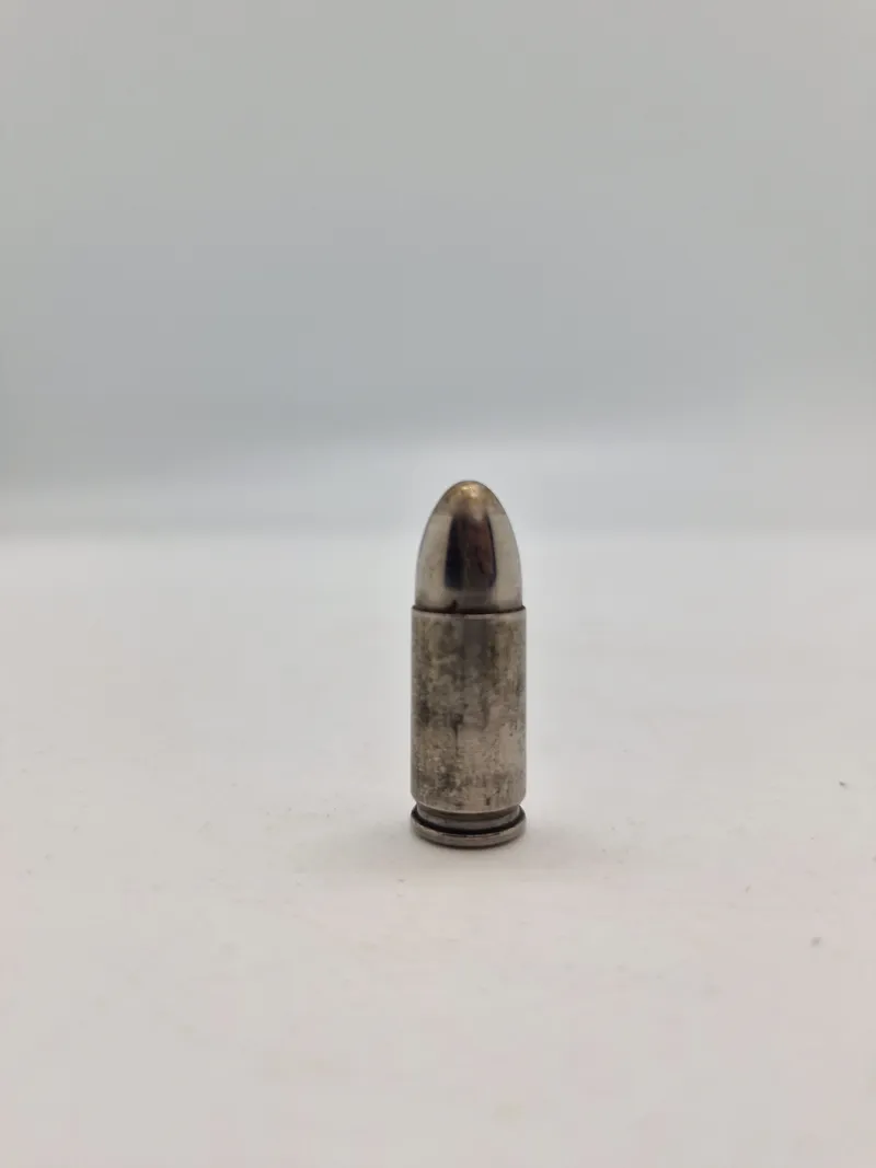 Original 9 mm værkstedspatron/eksercerpatron, brugt af politiet