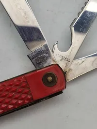 Jagtkniv med udtrækker til indvolde