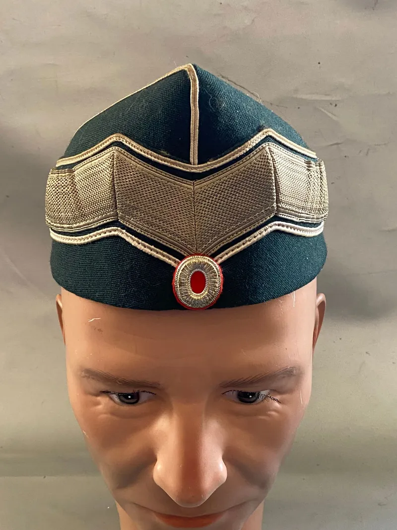Original spidshue M/69