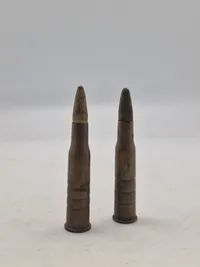To originale 8X58RD ekcerserpatroner for gevær 89