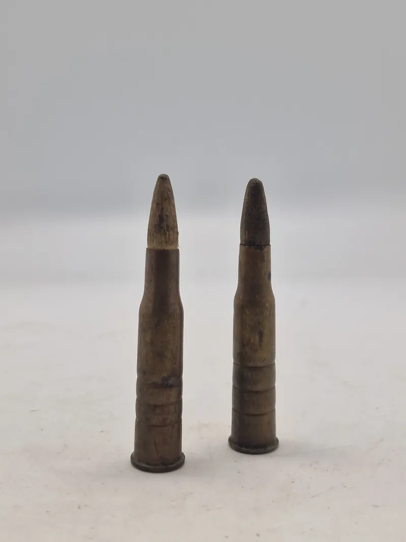 To originale 8X58RD ekcerserpatroner for gevær 89