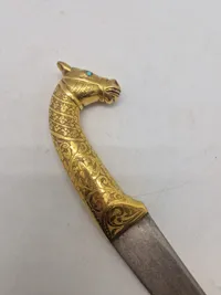 Veludført Indo Persian Mughal horse face dagger, with gold foiel plating and Damascus blade